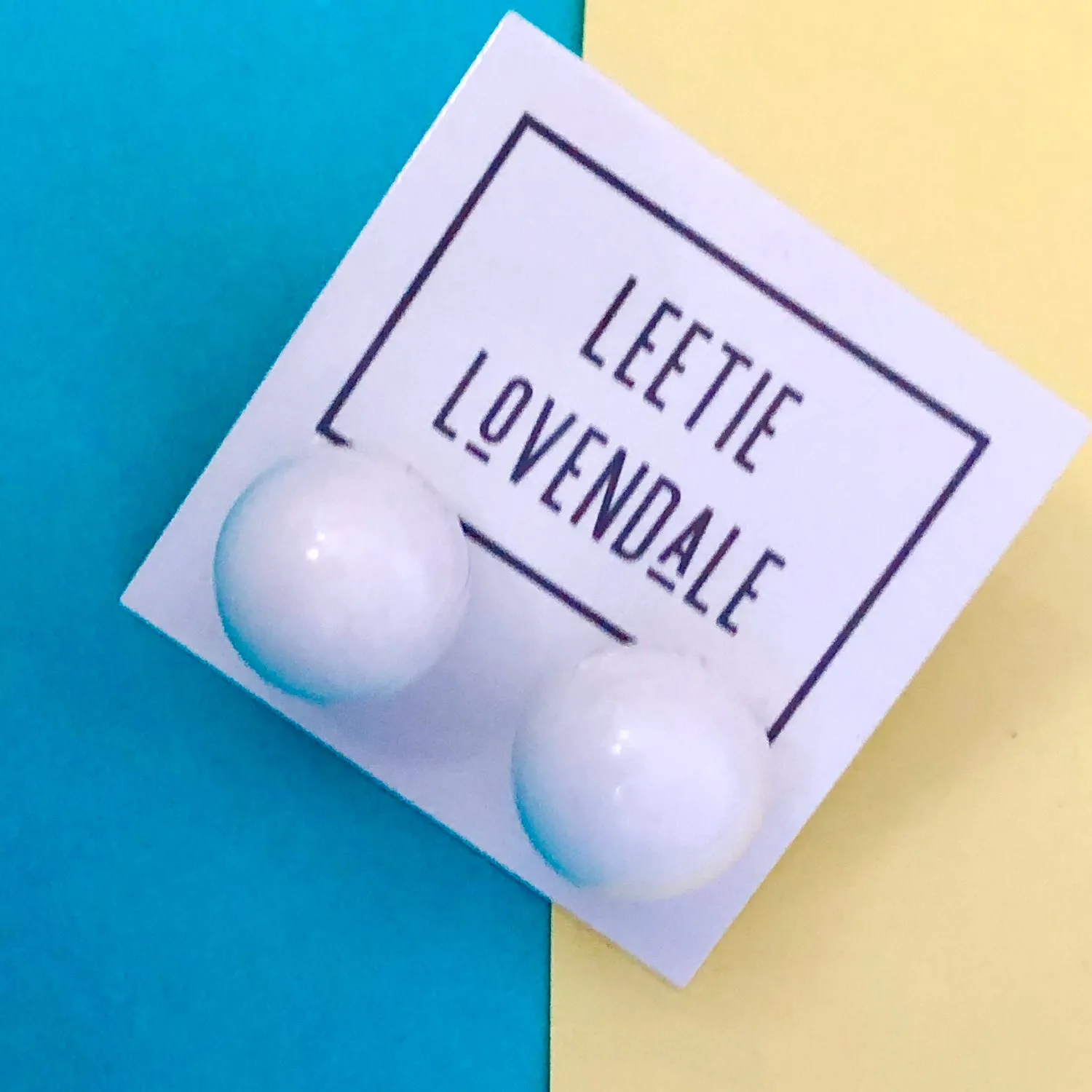White Mega Ball Stud Earrings
